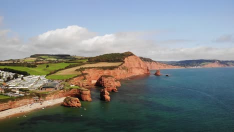 Aerial-Over-English-Channel-With-Ladram-Bay-Sea-Stacks-And-Sidmouth-In-Background