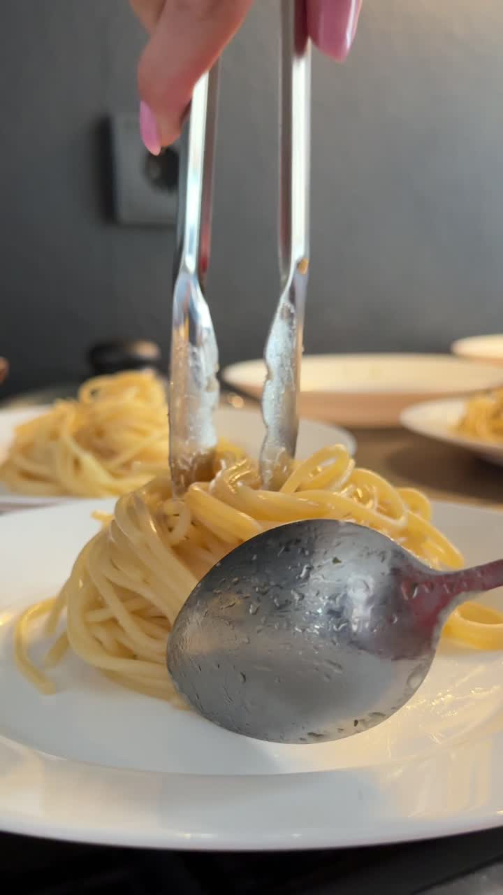 Woman eating spaghetti