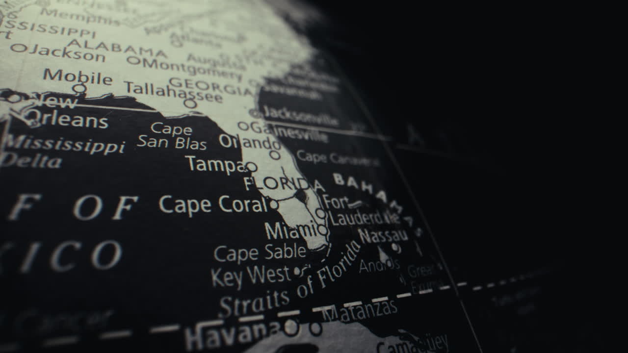Close-up of a vintage world map focusing on Florida and the Bahamas