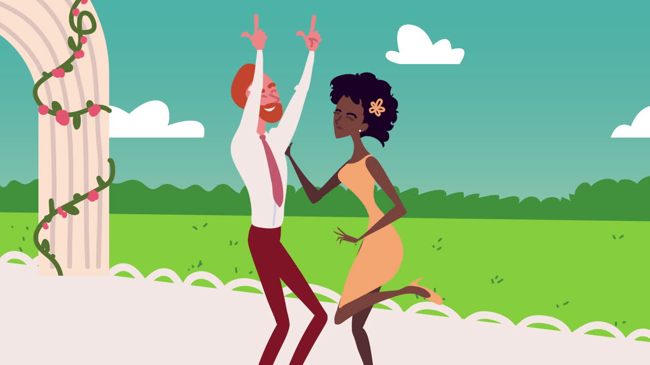 una pareja feliz bailando al aire libre.