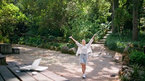 careless woman walking forest enjoying freedom harmony at sunny weekend.