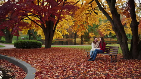 couple enjoying autumn in park