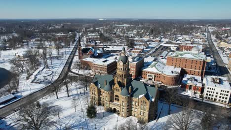 aerial view of courthouse with vintage architecture in the winter