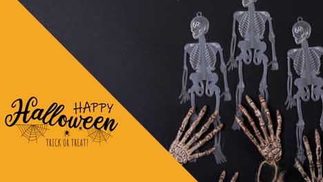 Animation-of-happy-halloween-text-over-skeletons