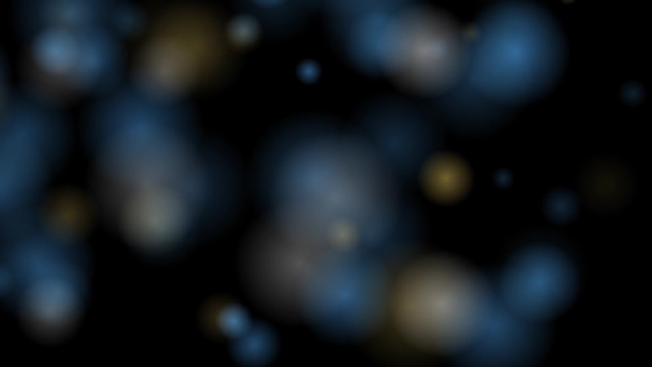 Abstract Background with Floating Blue and Gold Bokeh Lights