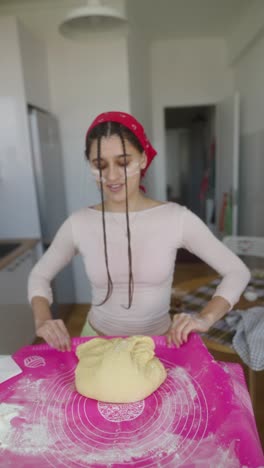 teenage girl baking bread