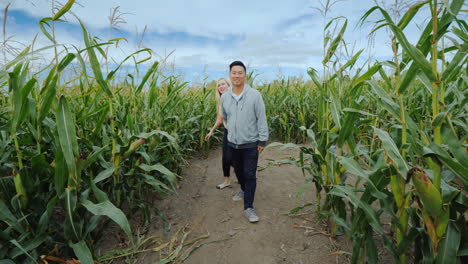 Young-Active-Multi-Ethnic-Couple-Having-Fun-In-A-Corn-Maze