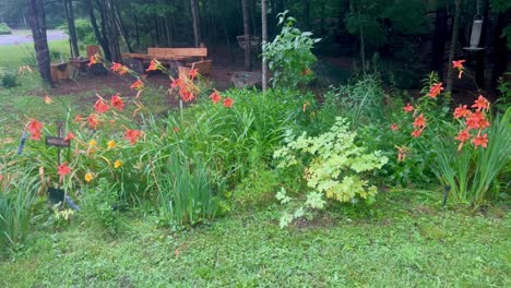 flower garden, birdhouses, and log seating area