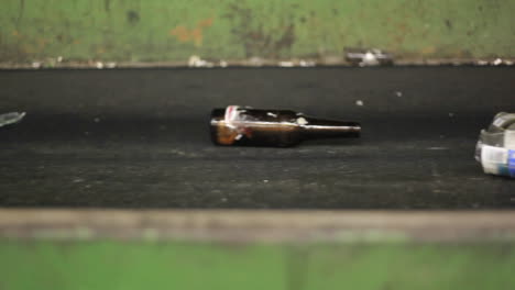 Bottles-and-cans-move-along-a-conveyor-belt-at-a-recycling-center-3