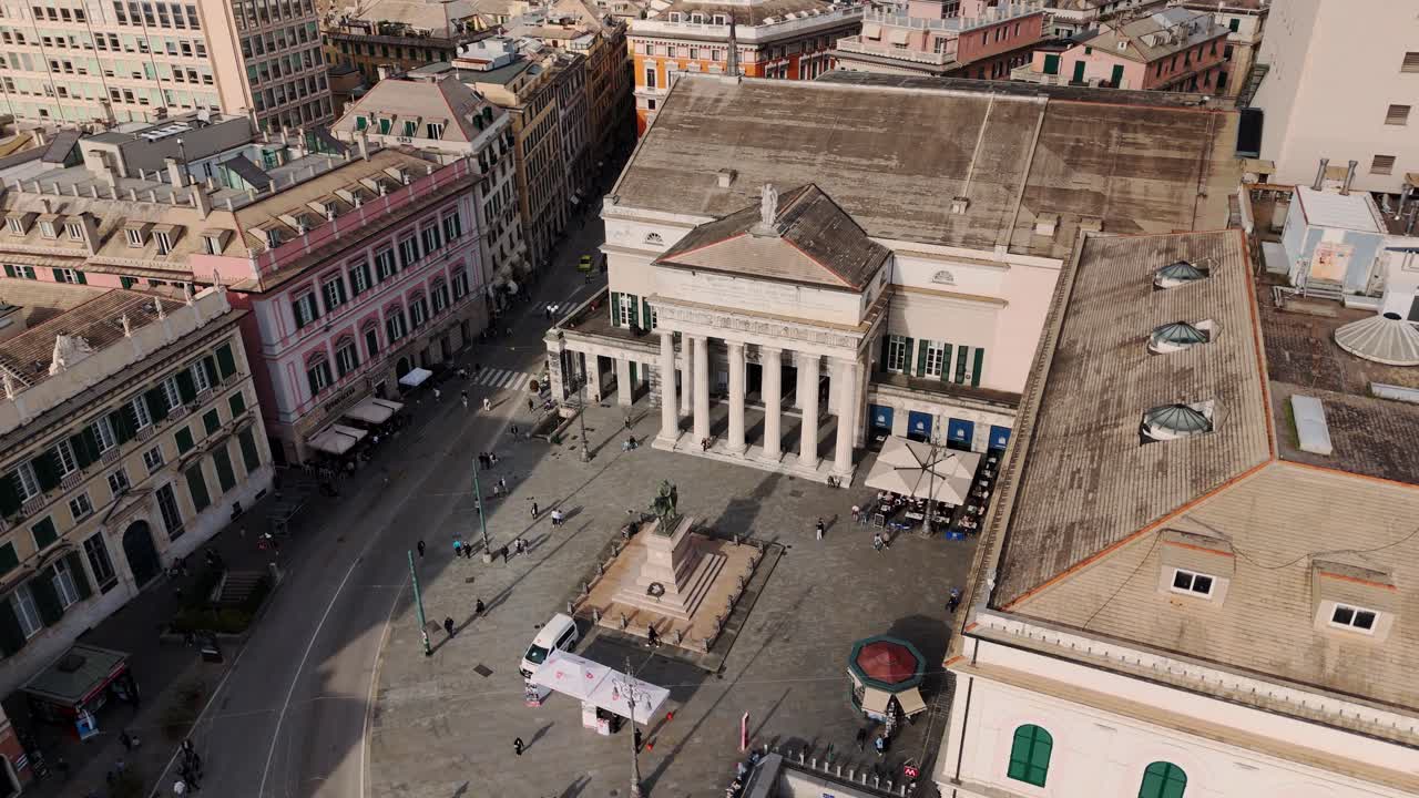 Genoa's historic city center with old buildings, streets, and a central square, aerial view