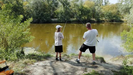 padre e hijo pescando
