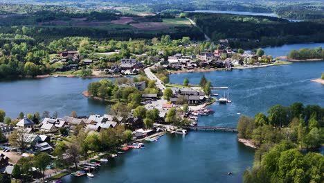 cozy and relaxing township of trakai in between two lakes, aerial view