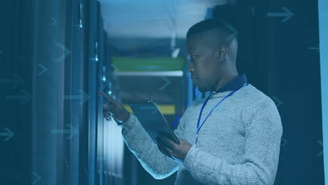 using tablet, person managing servers in data center environment with animation