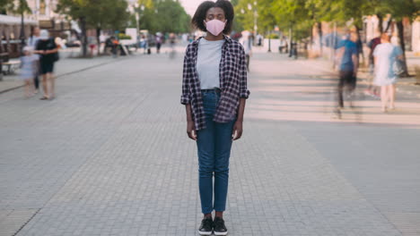 men wearing face masks in a city street