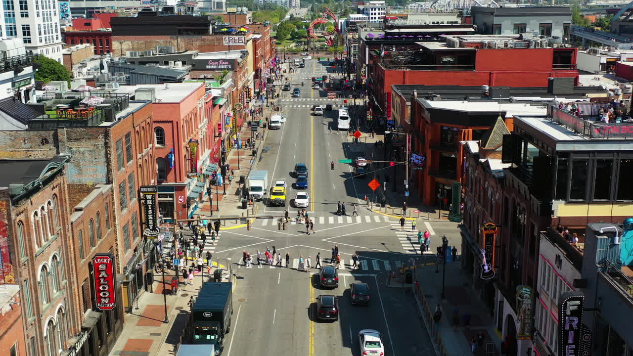 AERIAL: Traffic on the Broadway street, sunny day in Nashville, Tennessee, USA