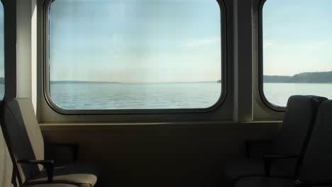 interior of ferry featuring empty seats with a nice view