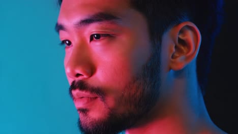 Portrait of a man with neon lighting