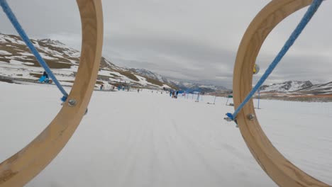 wooden sledding on a snowy mountain slope