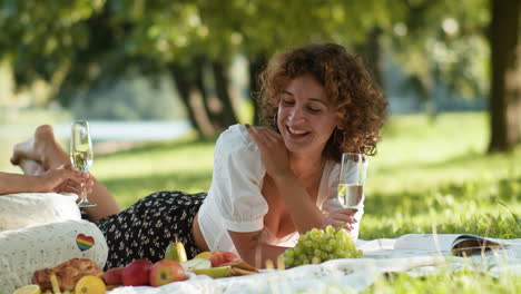 woman laughing with partner in the park