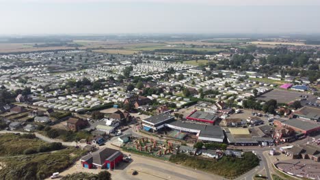 Hemsby-seaside-village-Norfolk-England-drone-pull-back-reveal-footage-4K