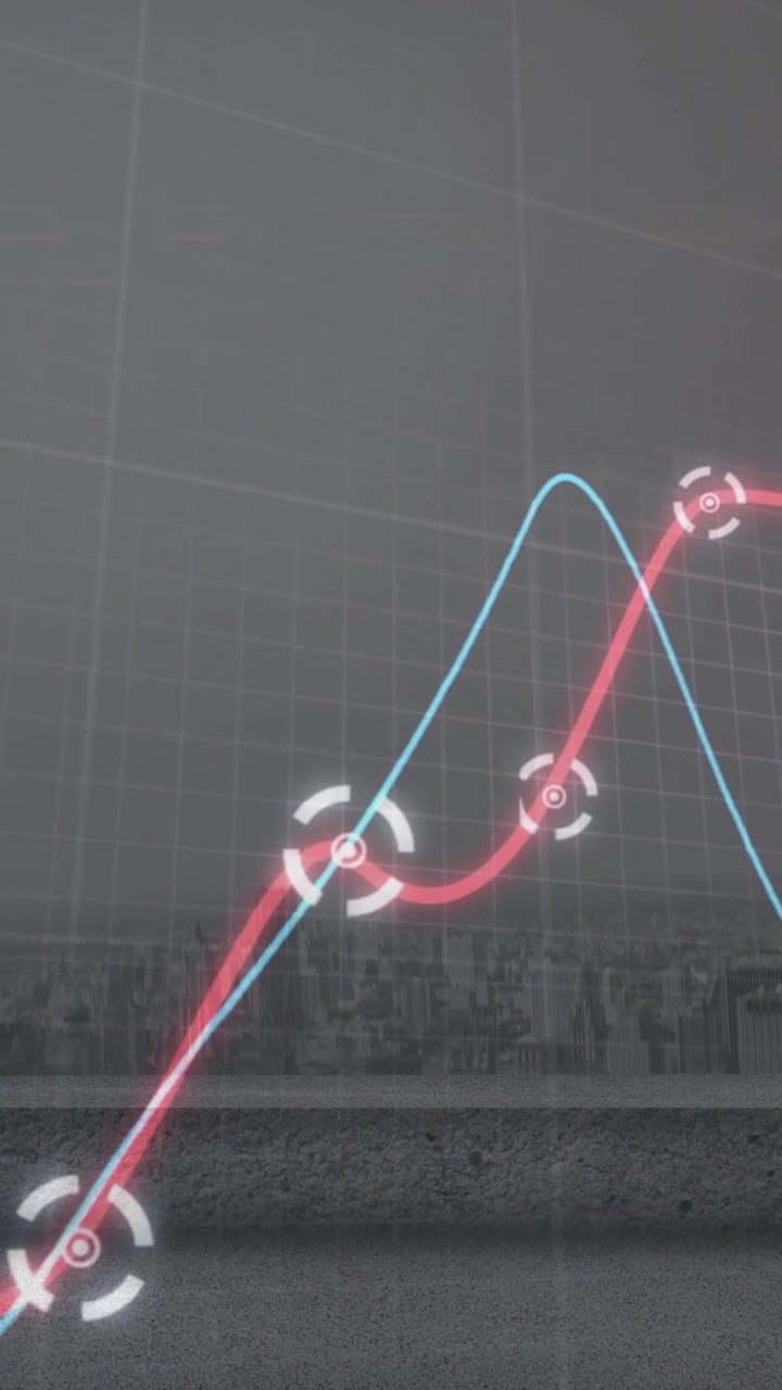 Animation of glowing graphs moving over grid network against aerial view of cityscape