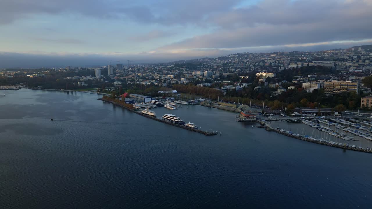 Aerial View of a Cityscape with a Marina and Lake