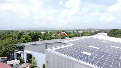 Drone-panorama-of-solar-panels-on-a-factory-rooftop