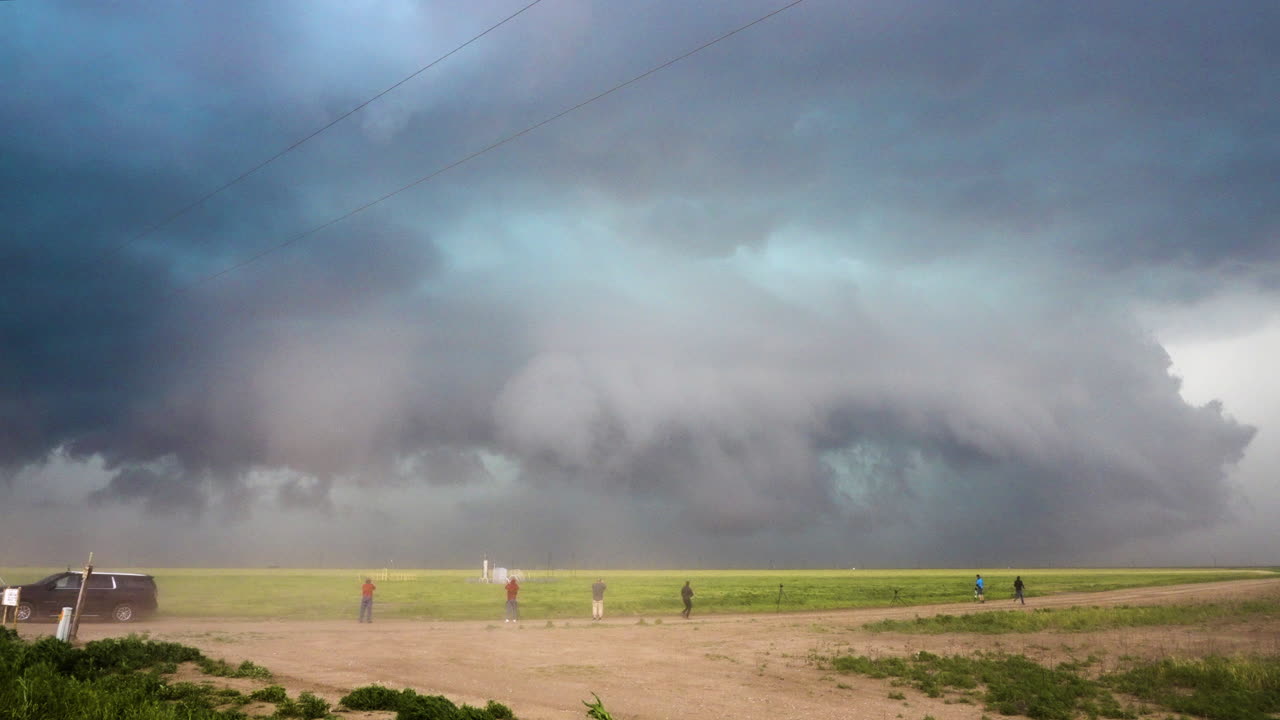 Dust Blows As Intense Storm Rages Storm Chasers Look On