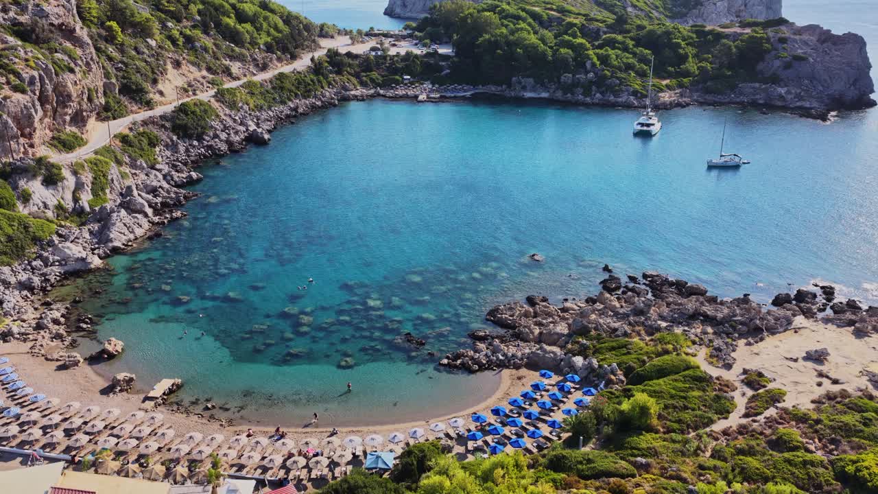 Beautiful Bay with Turquoise Water and Beach Umbrellas