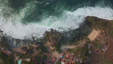 tidal waves rolling from above onto the shoreline