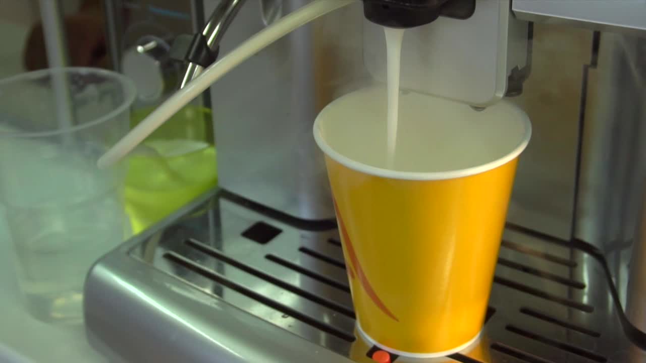 Coffee Machine Filling a Paper Cup