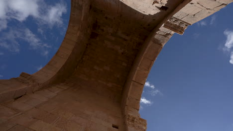 rotating shot of arch of hadrian in roman ruins in the jordanian city of jerash