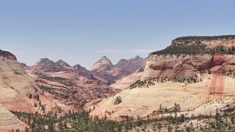 Drone-view-of-Bryce-Canyon-National-Park-in-Utah,-USA,-showcasing-unique-geological-formations-like-hoodoos-and-eroded-sandstone-rocks