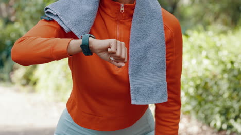 Woman-sports-runner-with-smartwatch-for-exercise