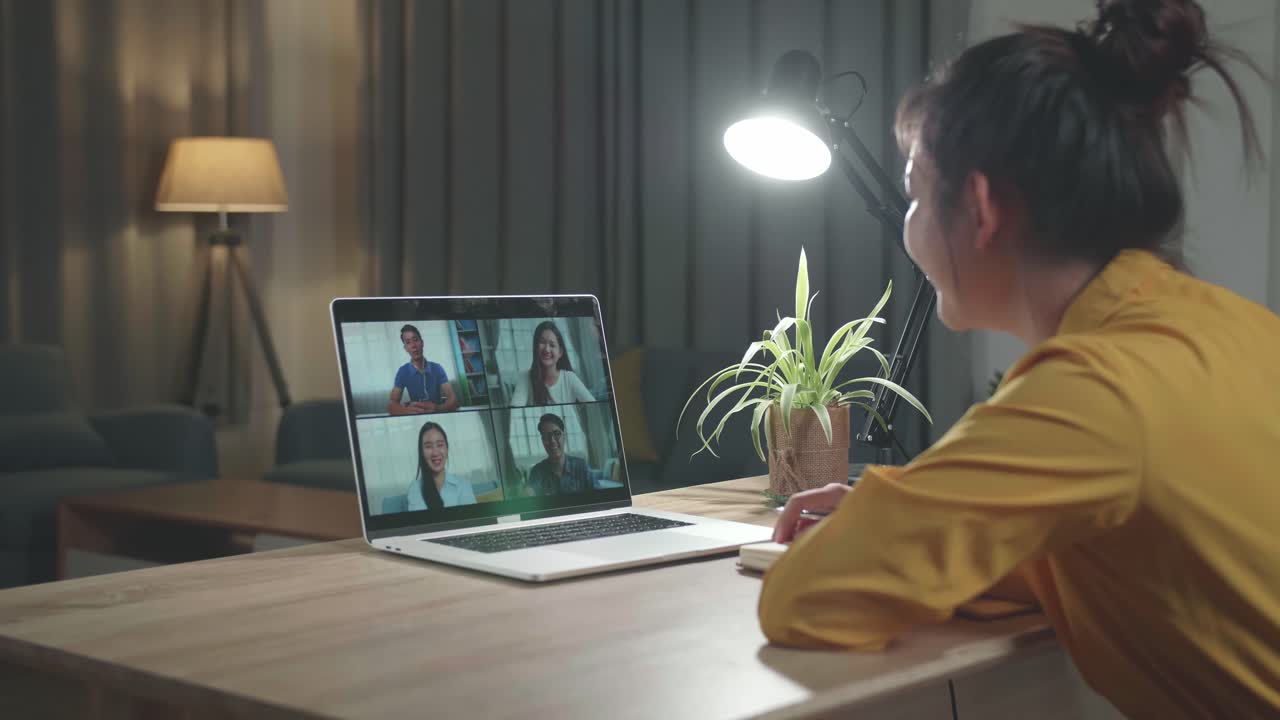 Asia Girl On Video Conference Call, Using Laptop Computer Work Late Night. Remote Meeting, Work At Home, Internet Technology