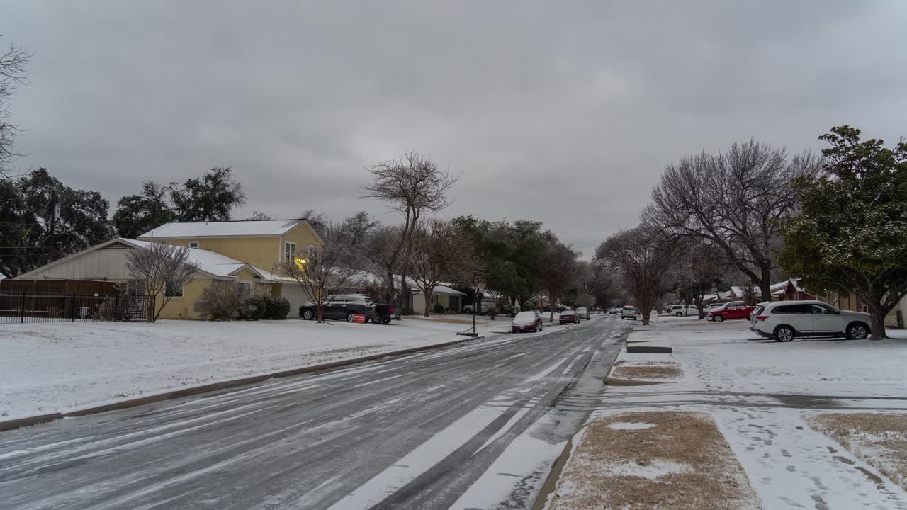 Snowy Residential Street at Dusk