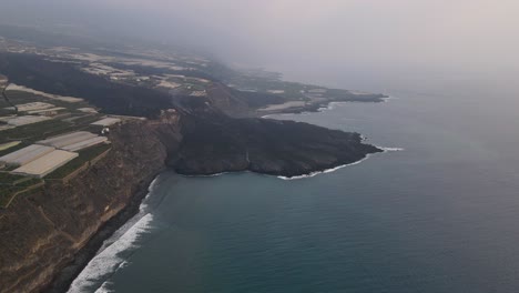 solidified lava flow in sea after volcano eruption at la palma, canary islands