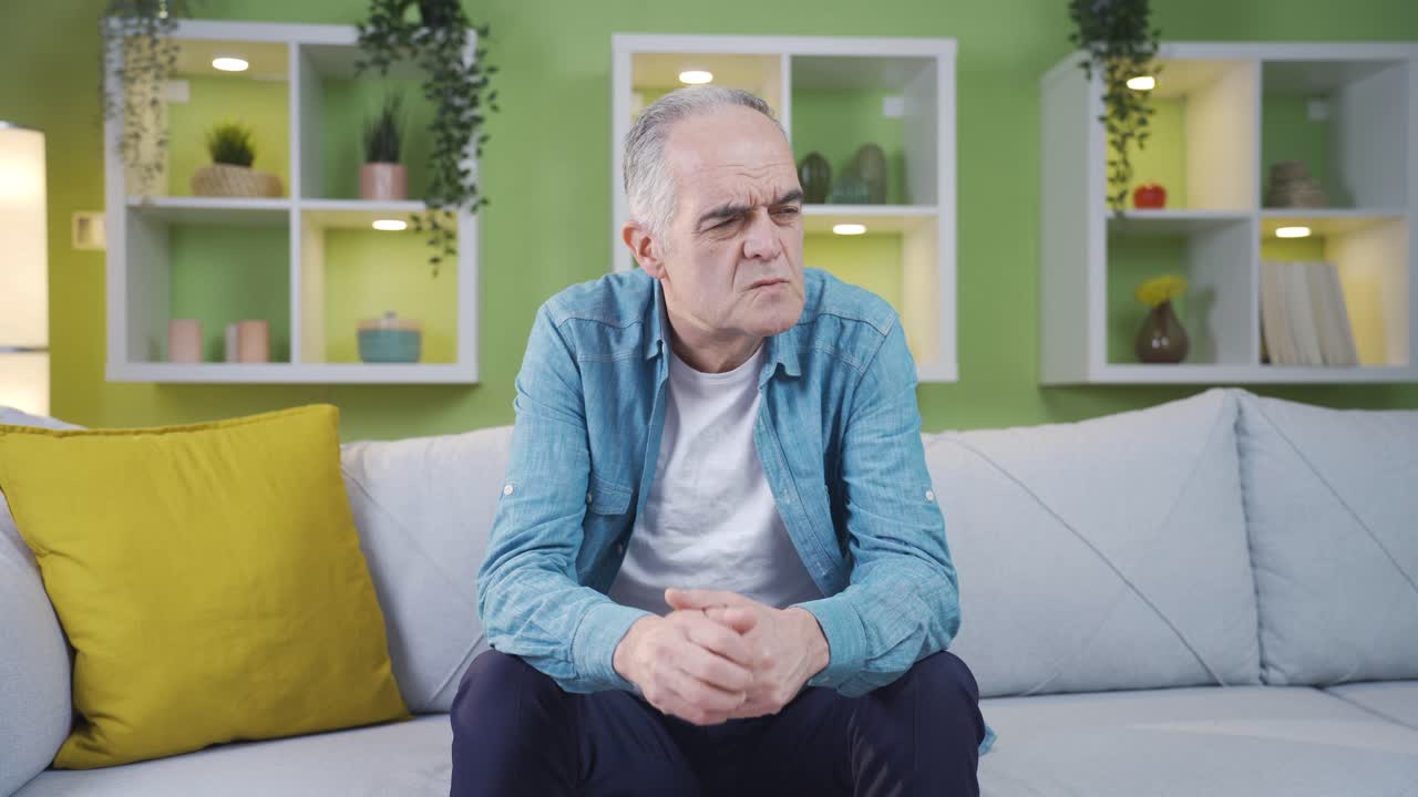 Forgetful old man. He's trying to remember.