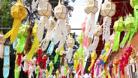 colorful lanterns swaying in the breeze