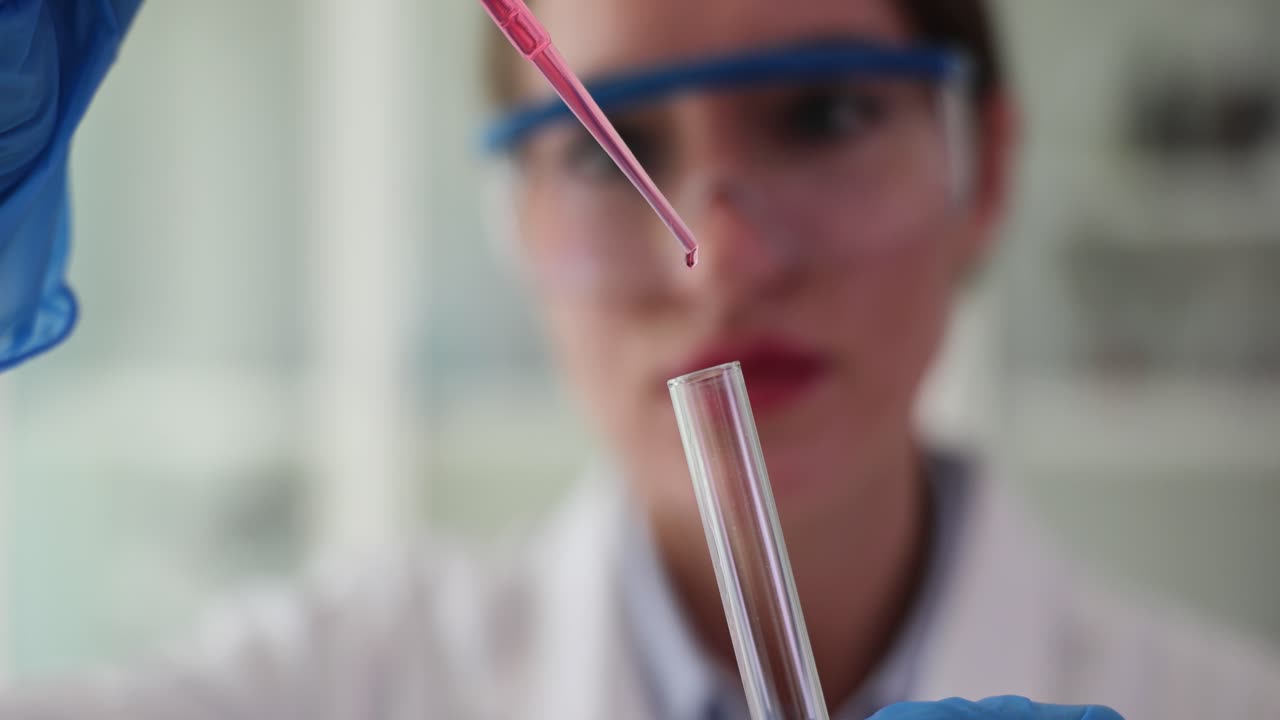 Scientist conducting experiment in laboratory