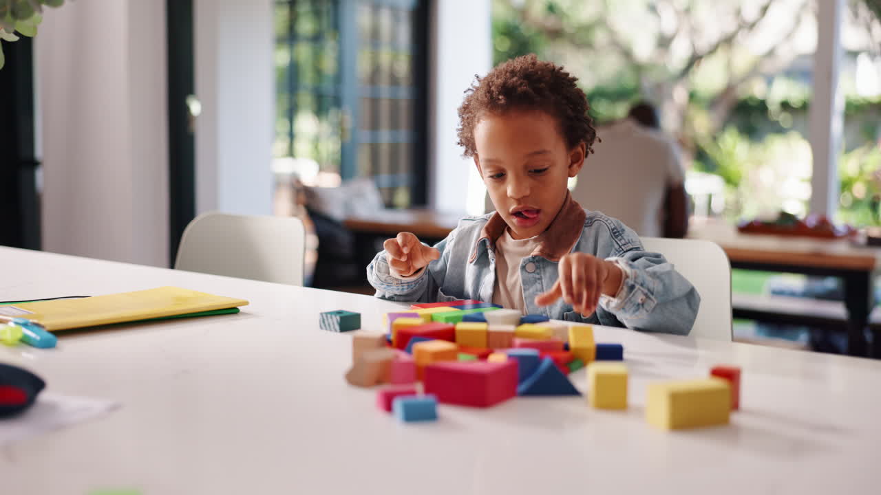 Child playing with building blocks