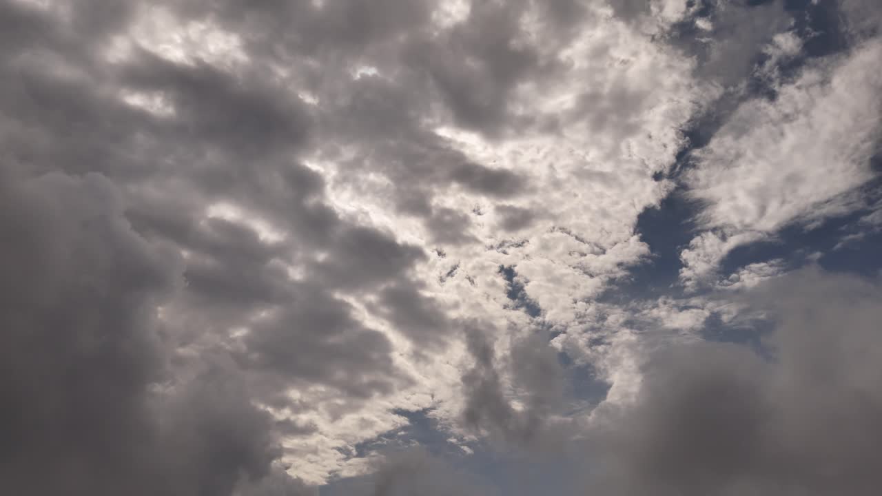 long scene from right to left looking towards the sky, with beautiful clouds, almost at the end it gets dark