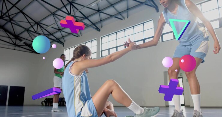Sitting player grasping teammate's hand pulling upward for basketball training with digital shapes