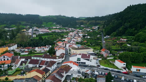 gloomy mountains town drone landscape. small village houses green valley nature