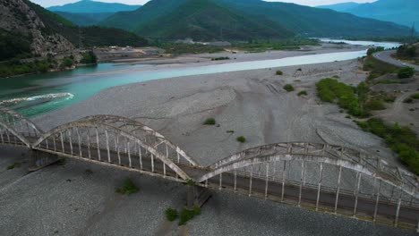 Legacy-in-Peril:-Century-old-Arched-Bridge,-Cultural-Monument-Over-Mat-River-in-Albania,-Faces-Deterioration