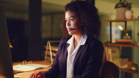 Smiling-black-female-helpdesk-worker-having