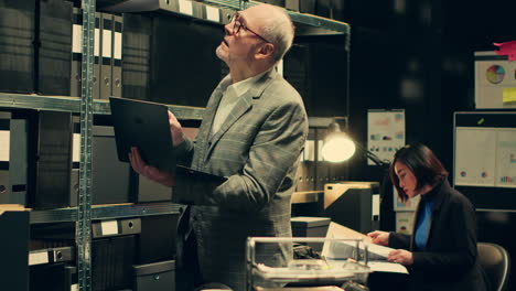 private investigator searching for files based on case names in archive