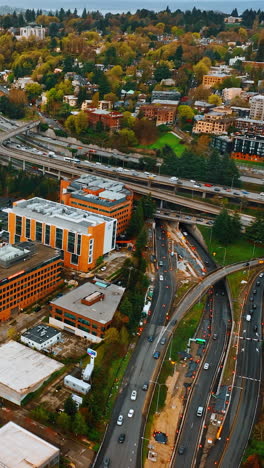 city buildings landscapes. top down aerial view the seattle downtown area. vertical video