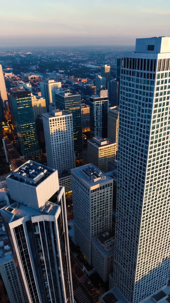 Aerial View of City Skyline at Sunrise or Sunset