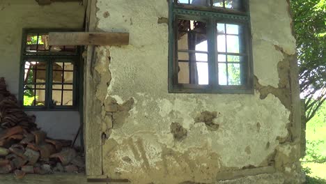 old and abandoned house wall and windows